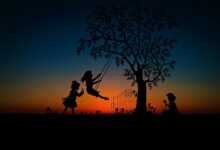 children, to play, rock, swing, game, leisure time, dusk, sunset, nature, evening atmosphere, mood, idyll, evening sky, romantic, tree, afterglow, heaven, poke, silhouette