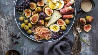 top view photography of fruits in plate