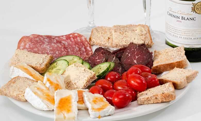 hors d'oeuvre, starters, appetizers, charcuterie, delicatessen, food platter, catering, cheese, salami, smoked beef, tomato, snack, bread, plate, cuisine, protein, antipasto, meat, tasty, platter, assortment, appetite, finger food, buffet, canapes, nourishment, nutrition, protein, protein, protein, protein, protein