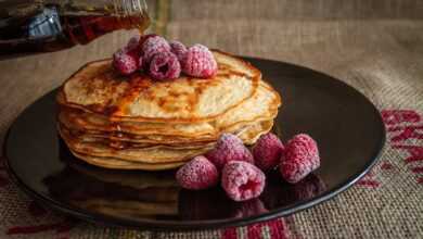 pancakes, maple syrup, raspberries