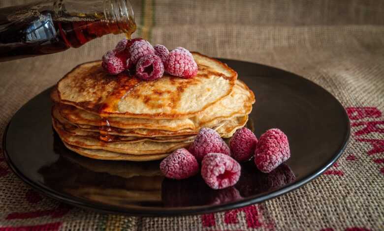 pancakes, maple syrup, raspberries