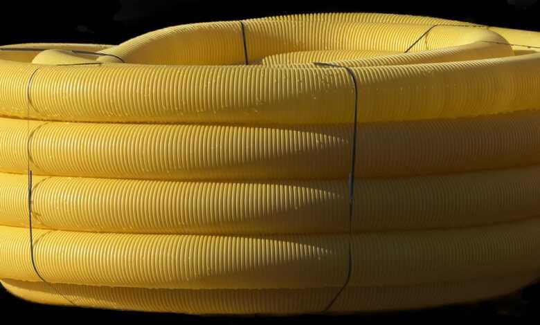 drain pipe, flexible, wound up, role, pvc, drainage pipe, drainage, tube, wrapped, plastic, yellow, construction site, pvc, pvc, pvc, pvc, pvc, drainage, drainage, drainage