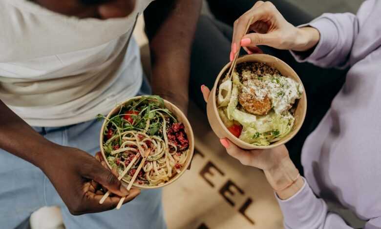 Man And Woman Eating Healthy Food