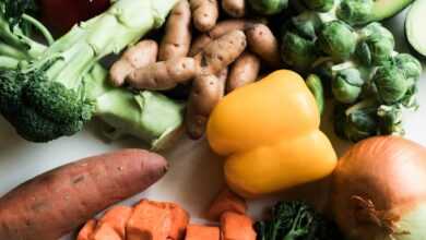 sliced carrots and green vegetable