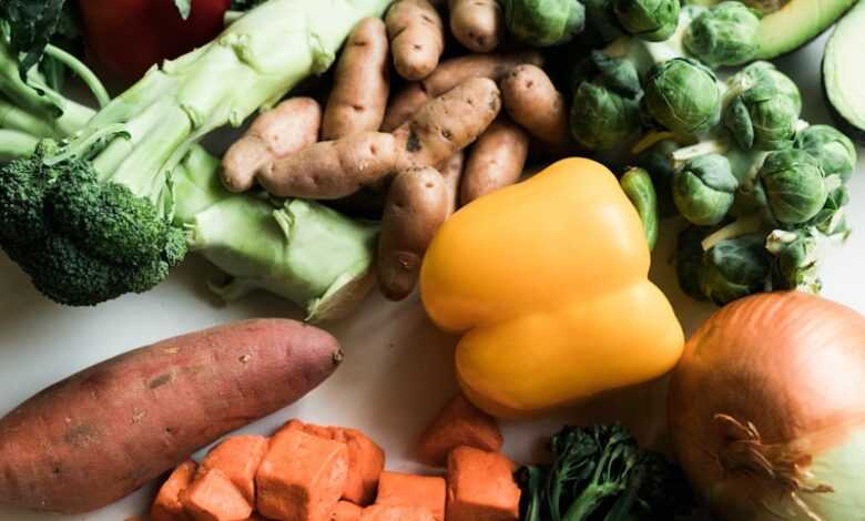 sliced carrots and green vegetable