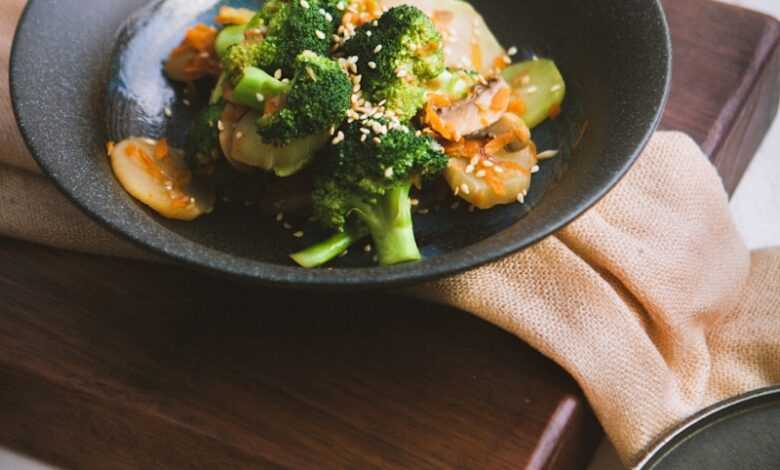 vegetable salad served on black ceramic plate