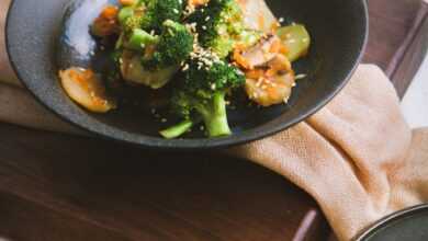 vegetable salad served on black ceramic plate