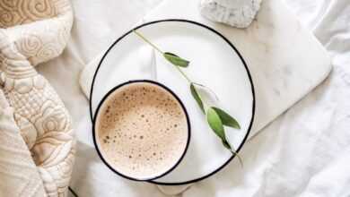 white teacup filled with coffee