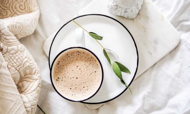 white teacup filled with coffee