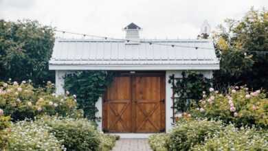 closed brown wooden door under cloudy sky during daytime