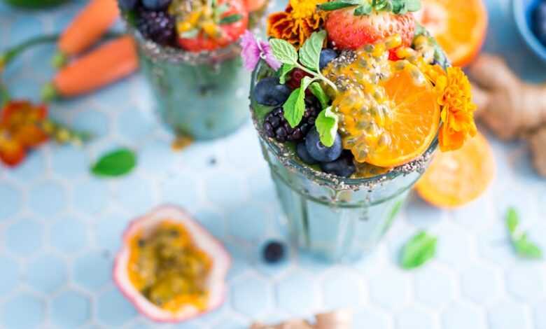 tilt shift lens photography of fruits in drinking glass