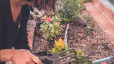 woman holding garden fork