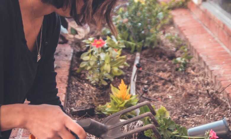 woman holding garden fork