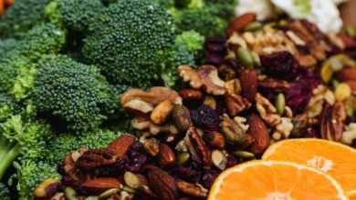 sliced orange fruit and green broccoli